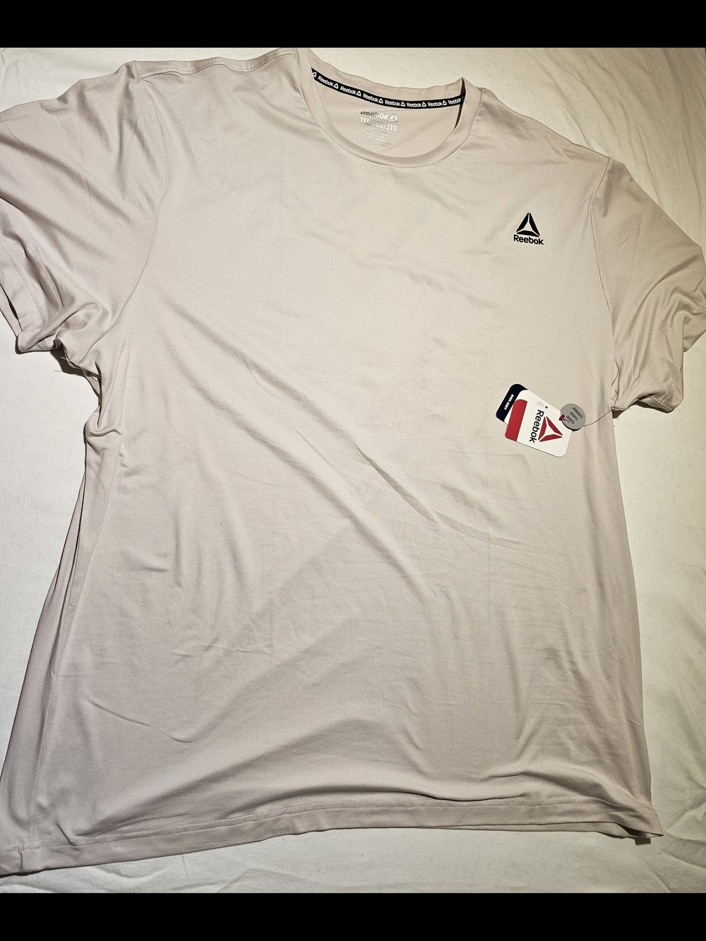 Reebok Men’s Pale Pink Athletic Tee